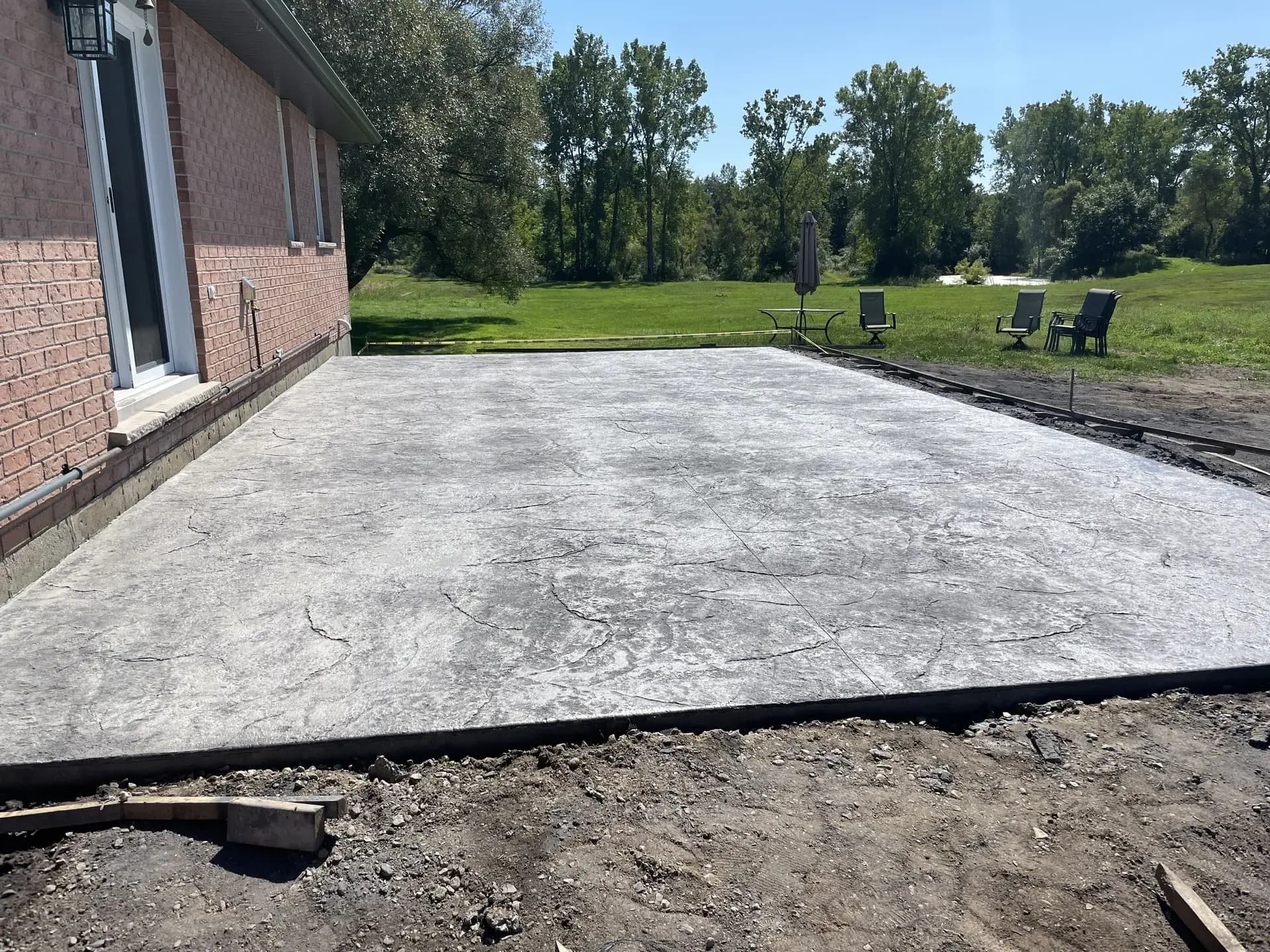 Backyard concrete driveway