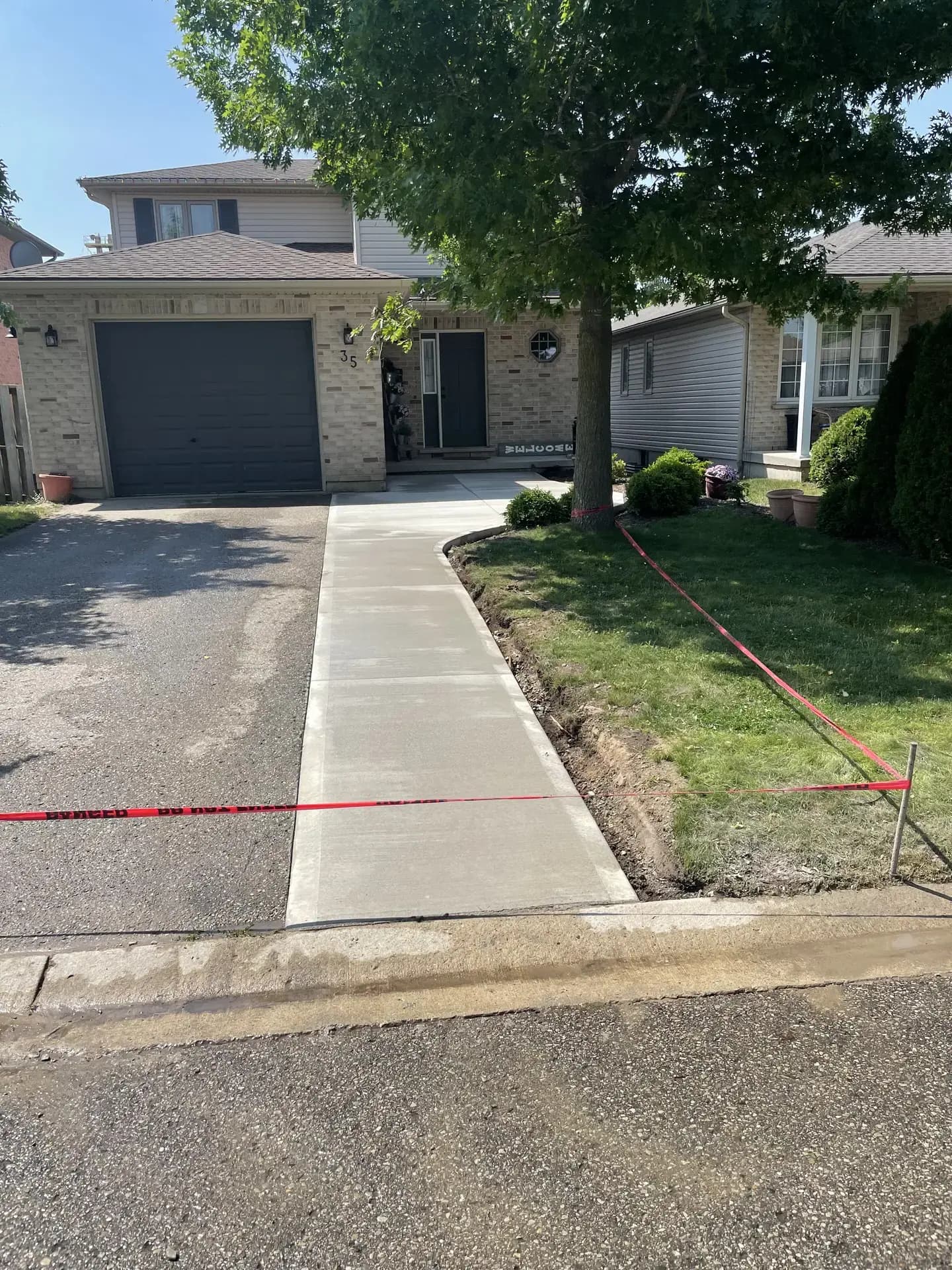Residential sidewalk and curb