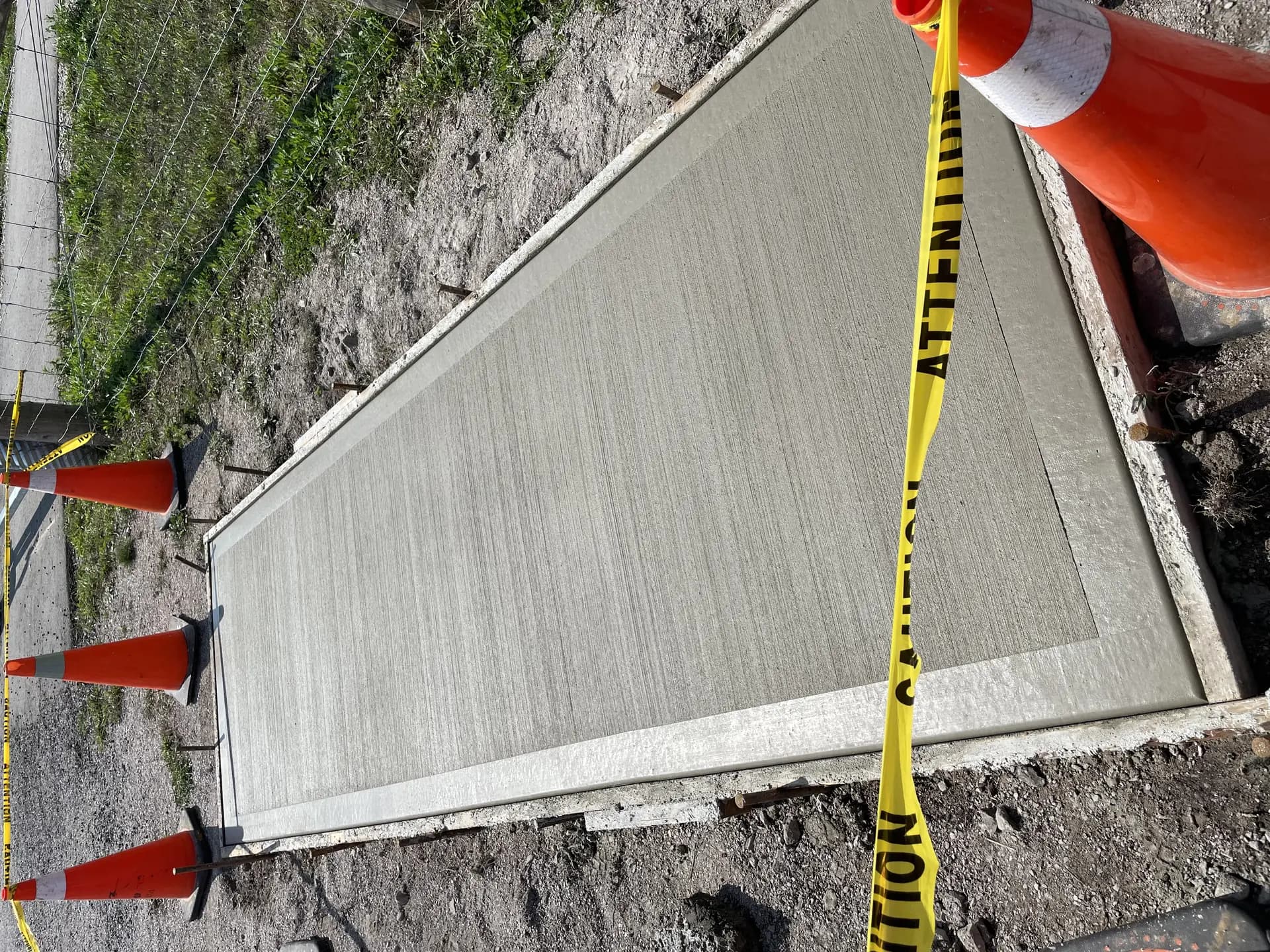 Freshly poured municipal sidewalk