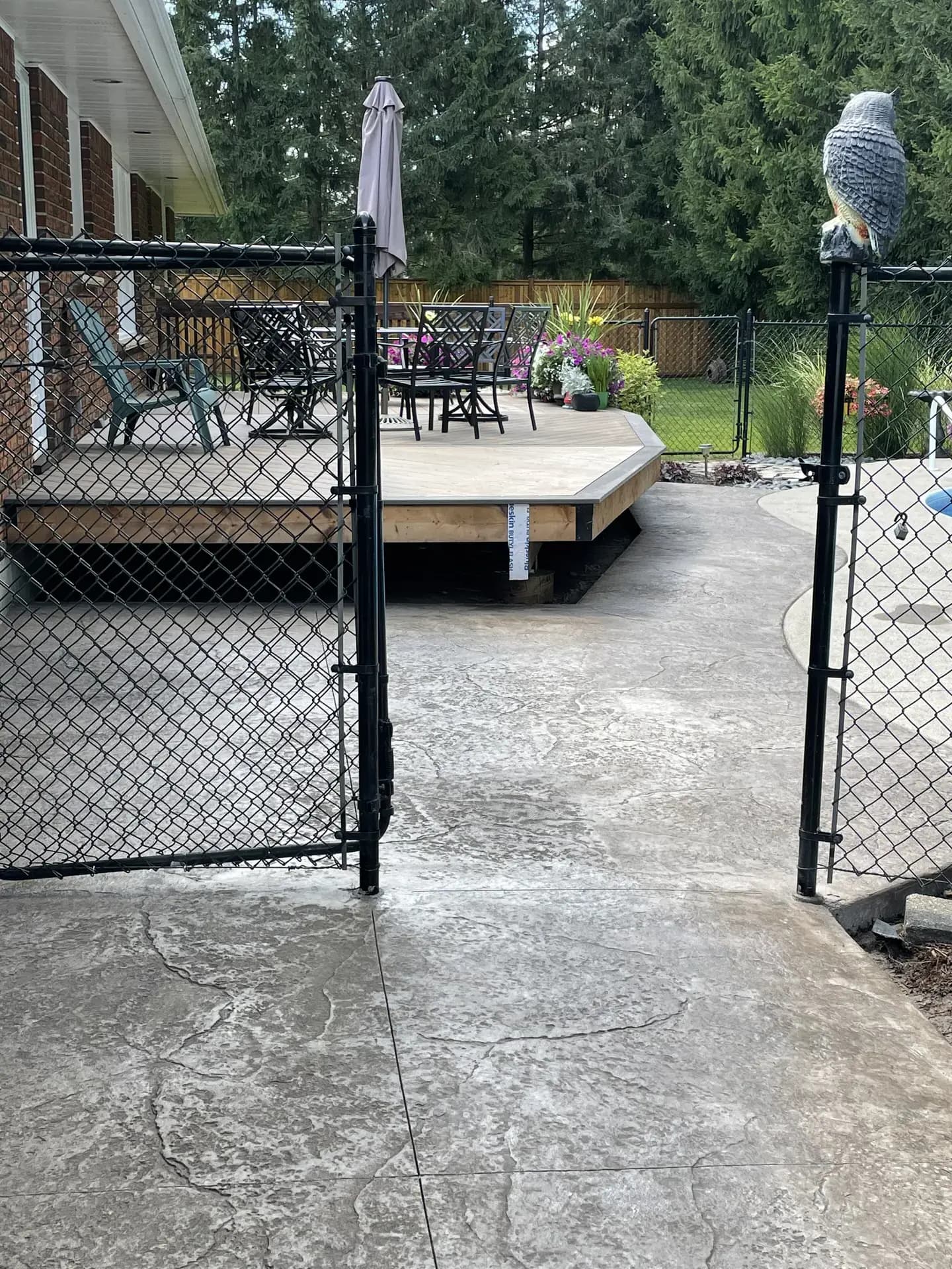 Stamped backyard patio wide view