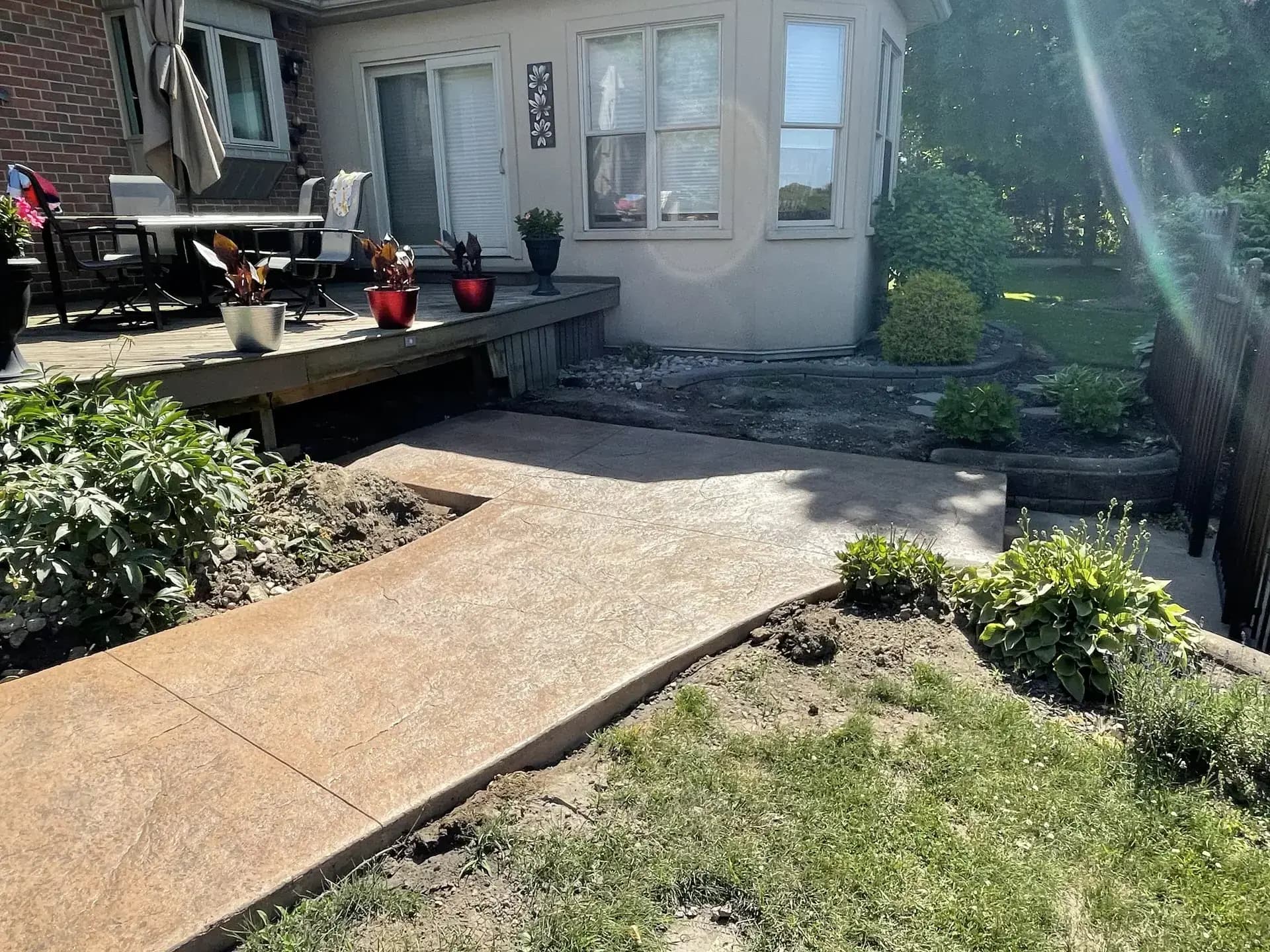 Stamped patio with outdoor kitchen