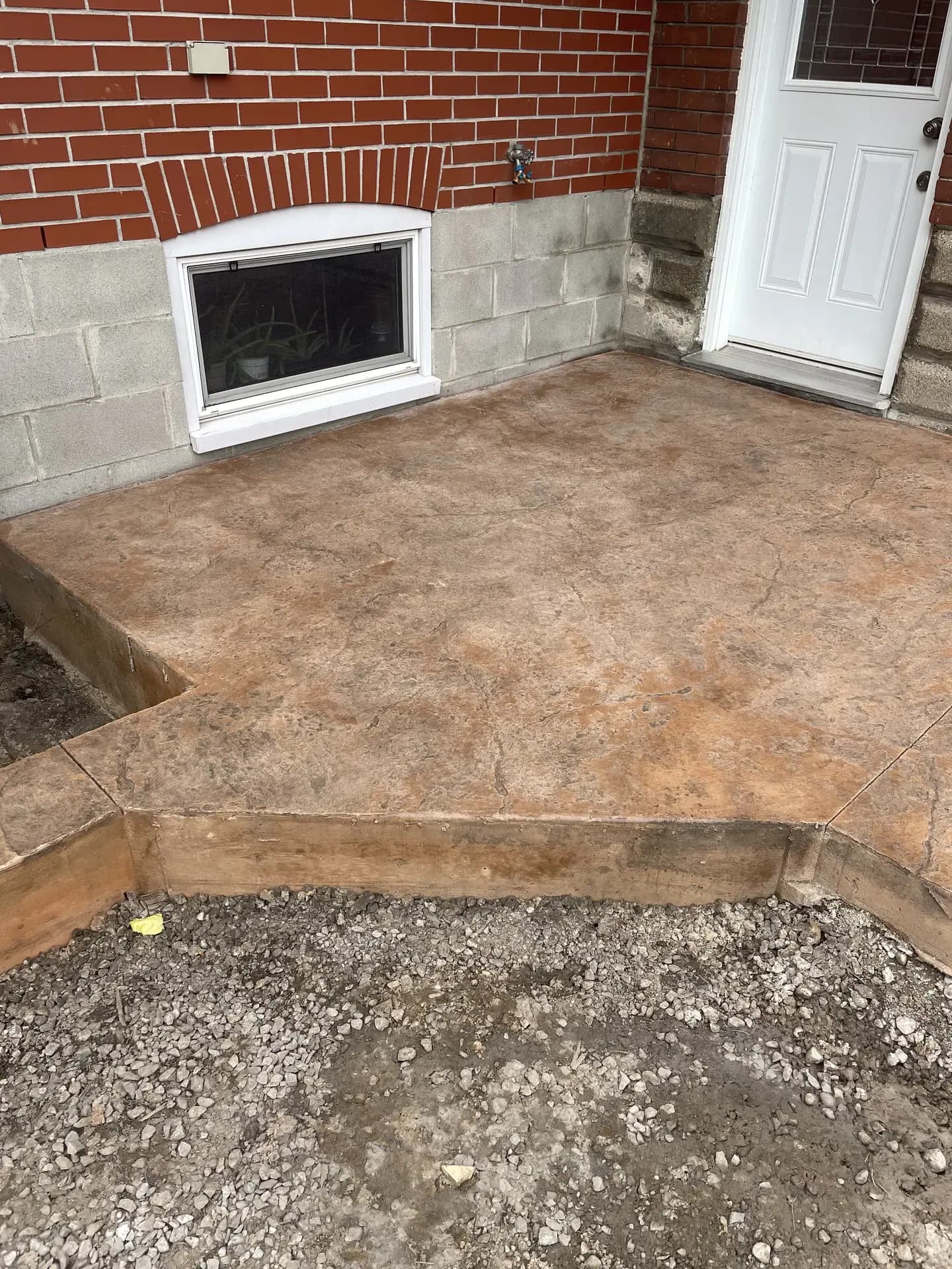 Brown stamped concrete walkway